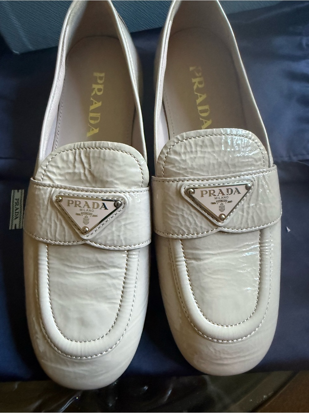 Prada Cream Patent Leather Loafers with Triangle Logo